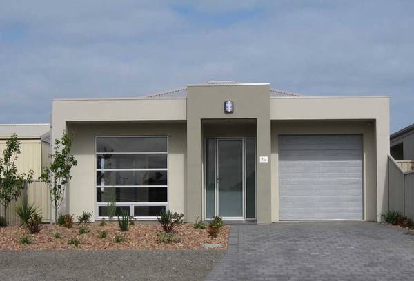 SUPERIOR QUALITY ARCHITECTURALLY DESIGNED TOWN HOUSE WITH LARGE LIVING AREA AND STUNNING FINISHES!! Picture 1