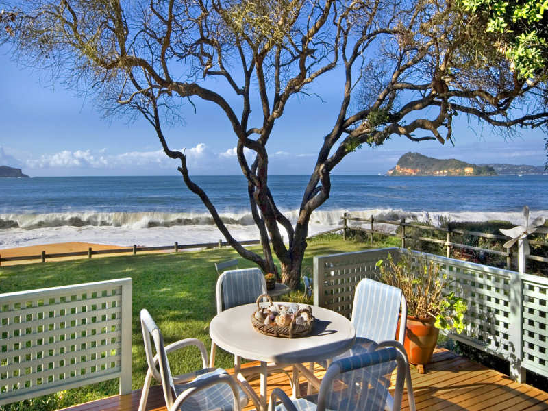 A Truly Unique Absolute Beachfront Picture 1