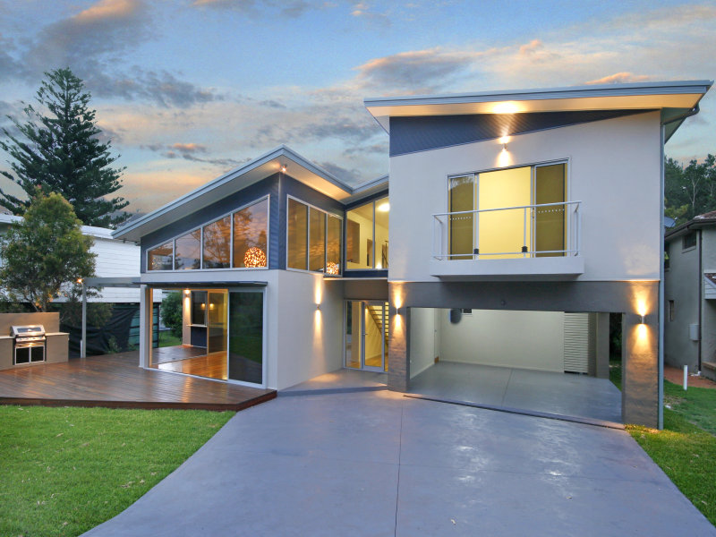 Why wait? Perfectly positioned new architect designed beach house! Reduced by $300k Picture 1