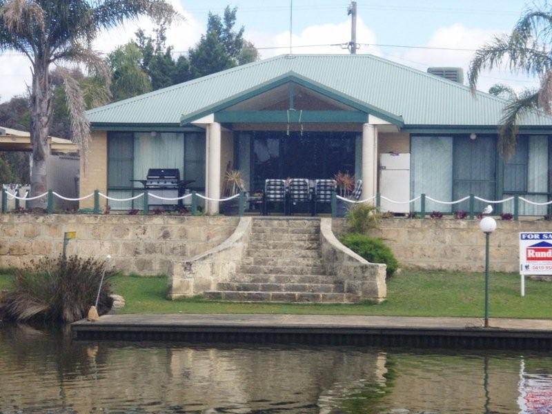 CANAL HOME NEEDS SOME T.L.C. Picture 1