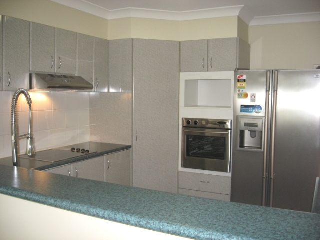 LUSH GREENERY SURROUND THIS BEAUTY THAT AFFORDS VIEWS OF THE SOUTHPORT GOLF COURSE.. Picture 3