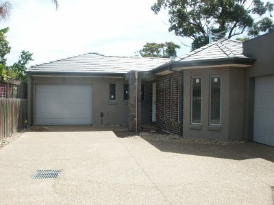 As new and only a short walk to the beach! Picture