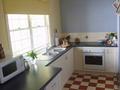 Comfortable, easy care living in the Heart of West End. Picture