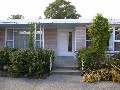 Family Home with Sunroom Picture