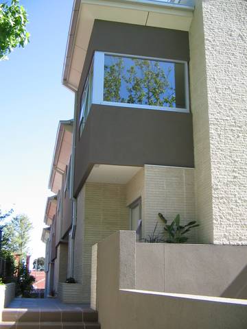 Modern & Sleek two bedroom plus recreation room, two bathroom townhouse oozing style and comfort! Picture 2