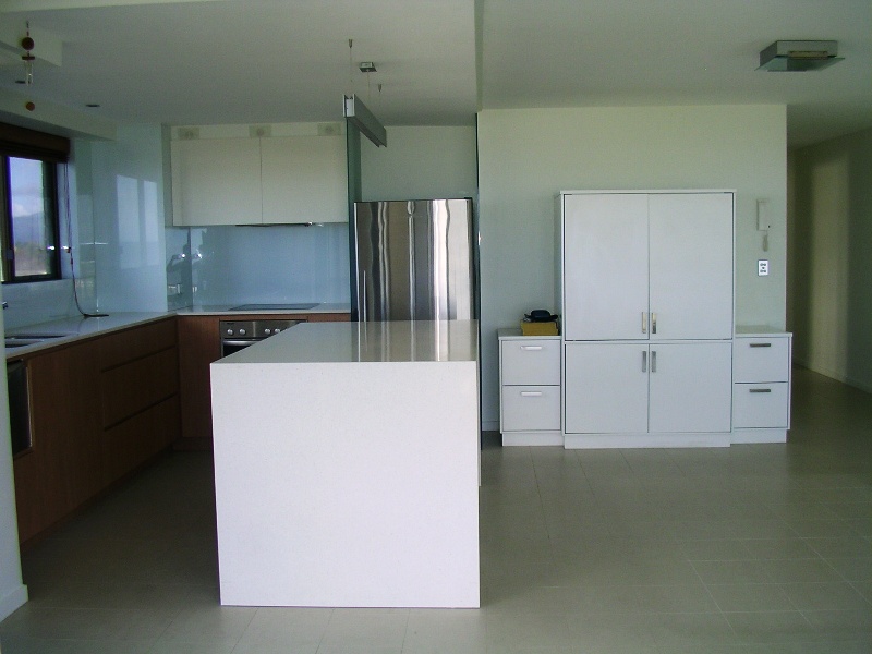 LOOKS CAN BE DECEIVING FROM THIS MODERN, ABSOLUTE BEACHFRONT UNIT! Picture